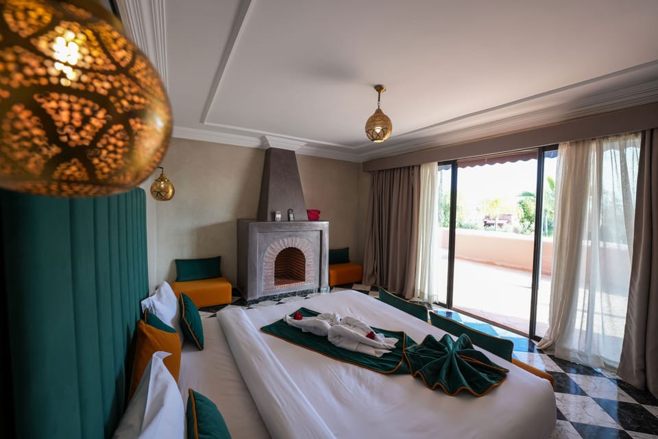 Junior Suite, 1 King Bed, Private Bathroom, Garden View | 1 bedroom, in-room safe, free WiFi