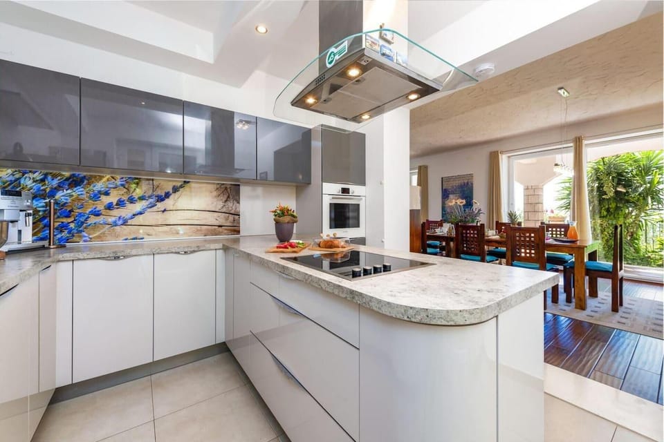 Villa | Private kitchen | Fridge, microwave, oven, stovetop