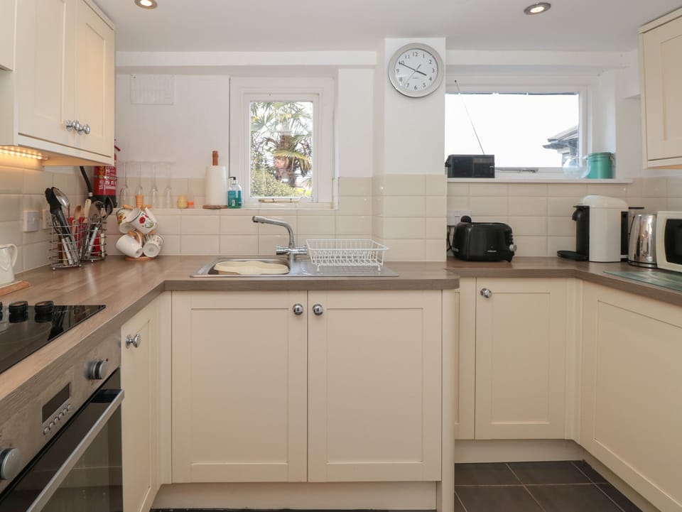 Fridge, electric kettle, toaster, cookware/dishes/utensils