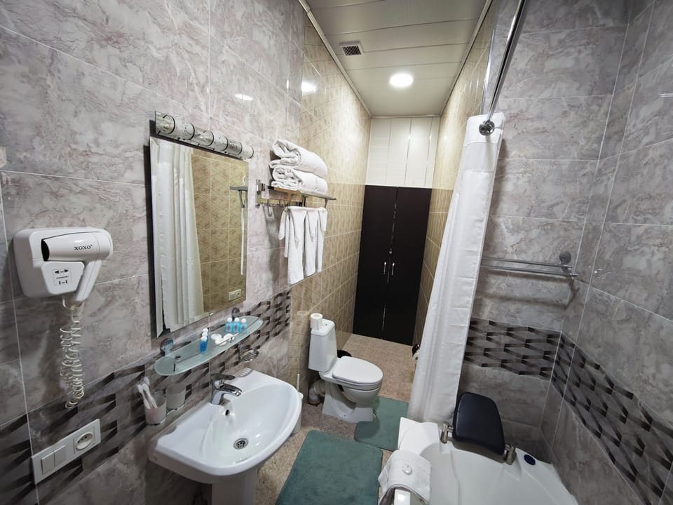 Family Double or Twin Room, 2 Double Beds | Bathroom | Shower, hair dryer, bathrobes, slippers