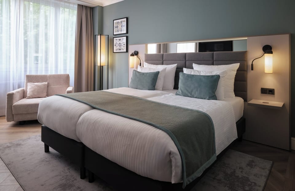 Hypo-allergenic bedding available, minibar, in-room safe, desk