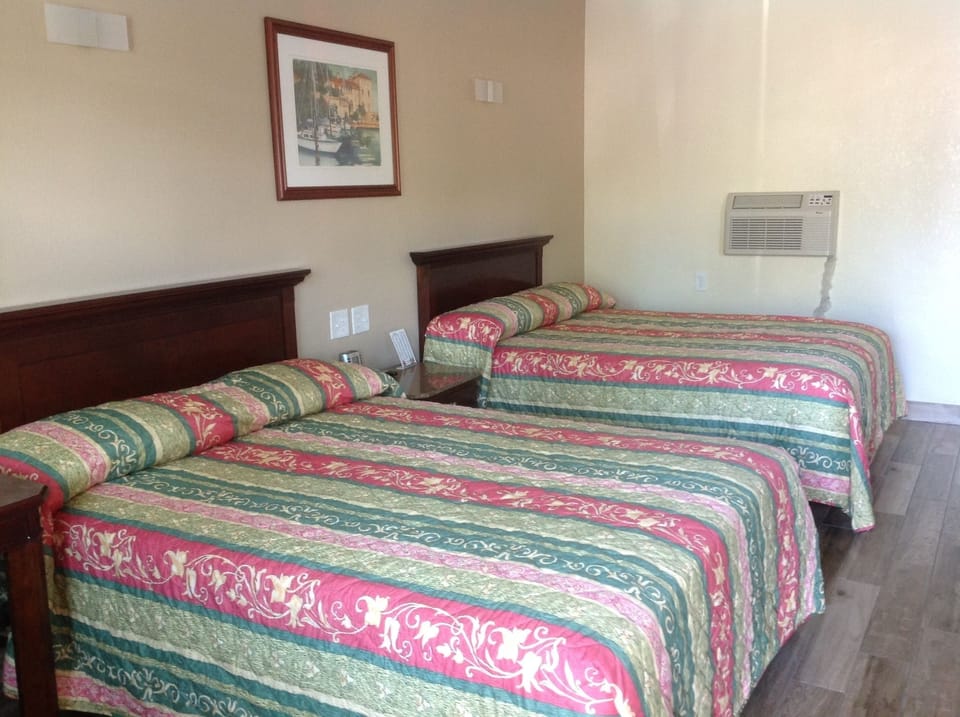 Room, 2 Queen Beds, Smoking | Living area | TV