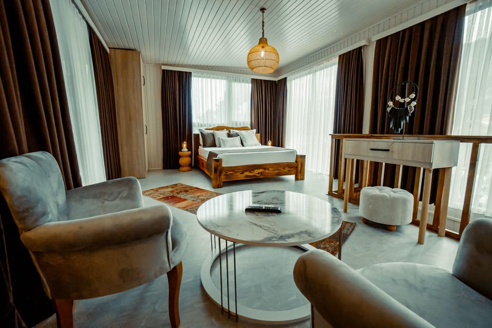 Luxury Duplex, Multiple Beds, Jetted Tub, Pool View | Premium bedding, minibar, individually decorated, individually furnished