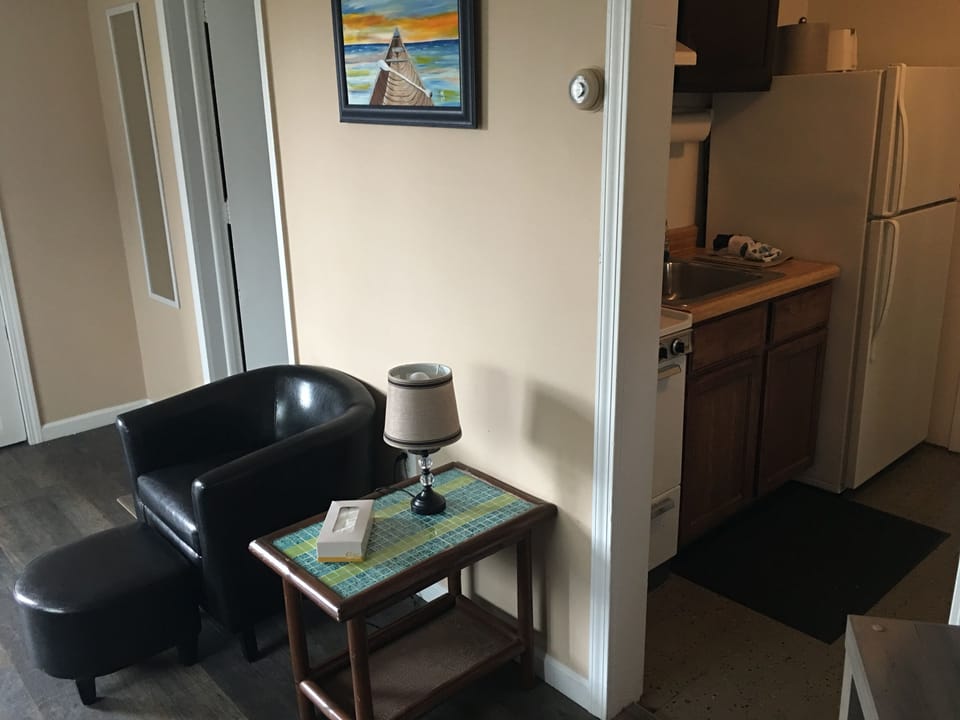 Family Apartment, Kitchenette, Lake View | Living area | TV