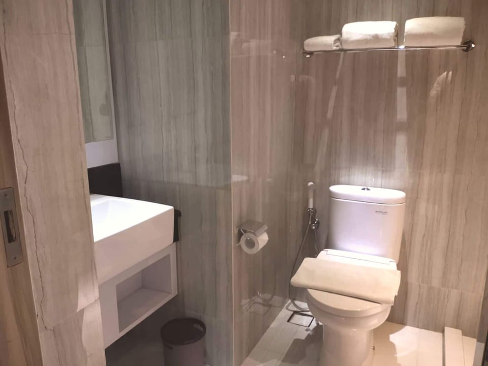 Shower, hydromassage showerhead, slippers, towels