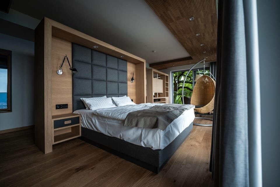 Exclusive Suite, 1 King Bed with Sofa bed, Slope side | Pillowtop beds, in-room safe, individually decorated, desk