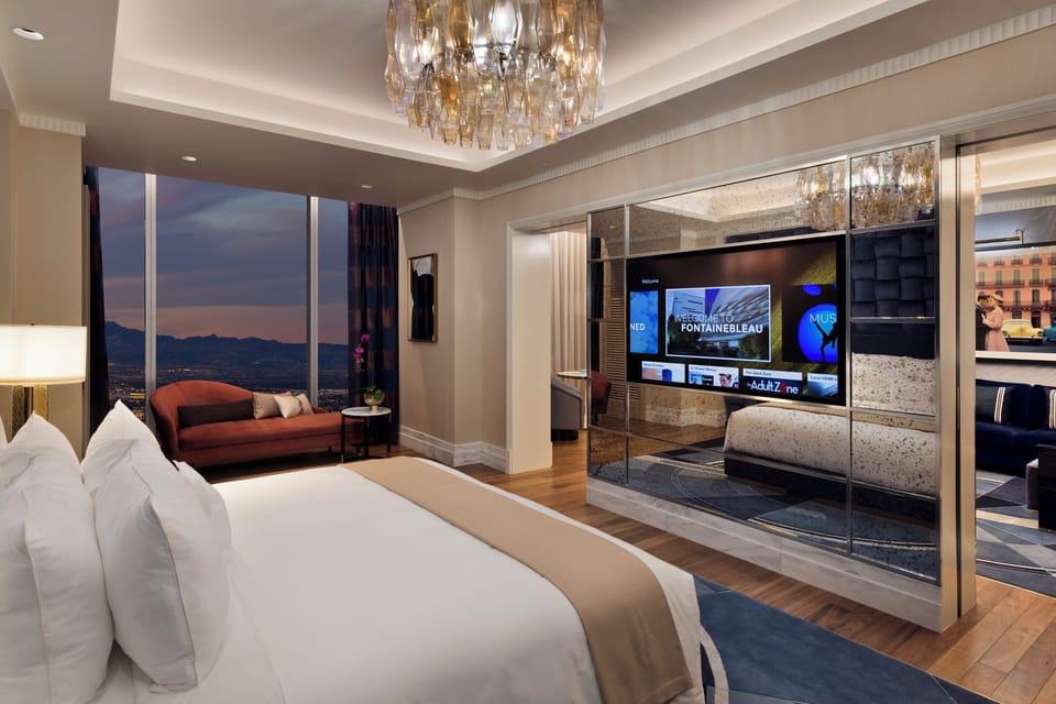 Fleur de Lis Monogram Suite | Bathroom | Designer toiletries, hair dryer, bathrobes, slippers