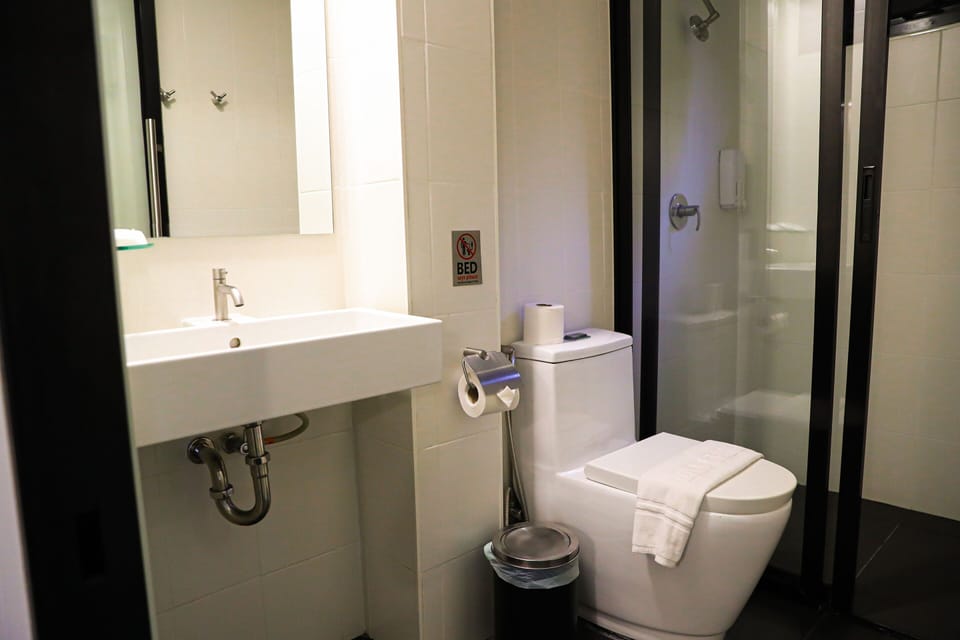 Shower, free toiletries, hair dryer, slippers