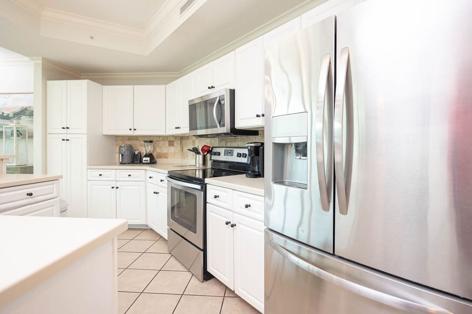 Condo, 2 Bedrooms | Private kitchen | Coffee/tea maker, fridge, oven