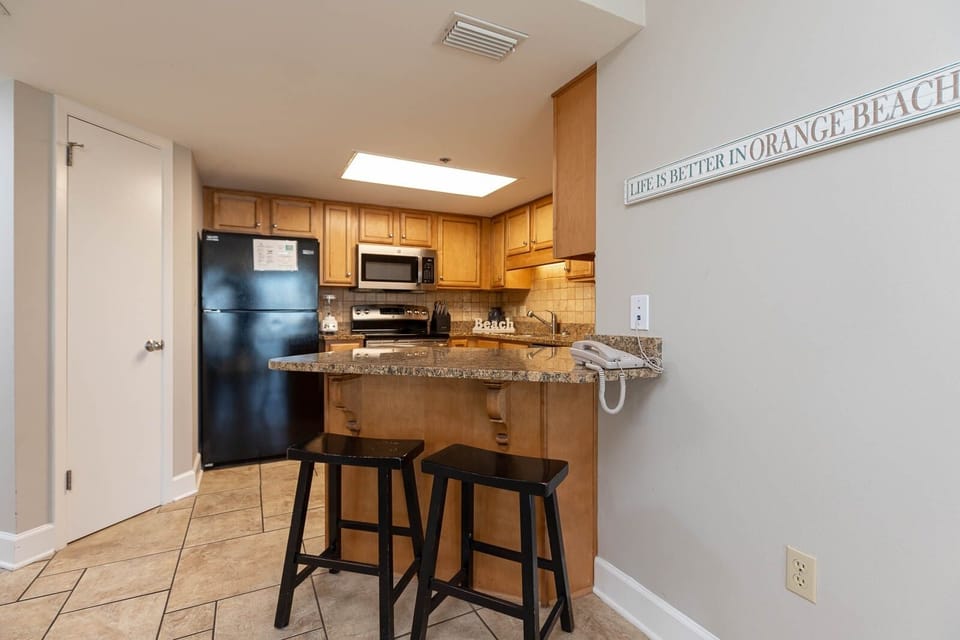 Condo, 2 Bedrooms | Private kitchen | Coffee/tea maker, fridge, oven