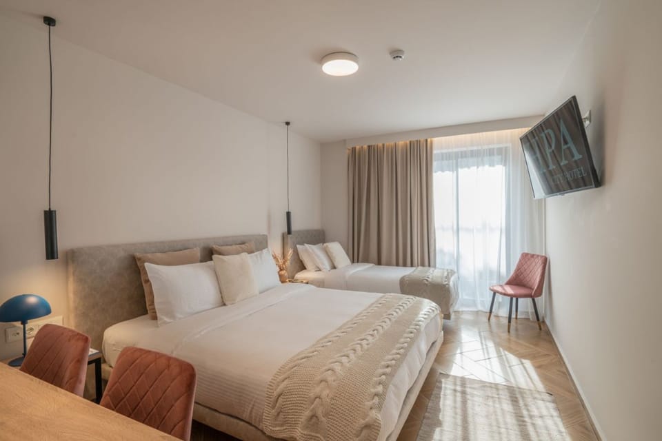 Superior Triple Room | Hypo-allergenic bedding, minibar, in-room safe, laptop workspace