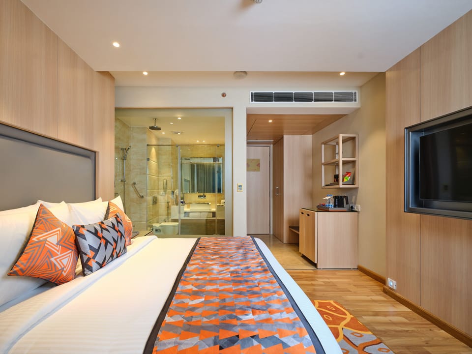 Premium bedding, down comforters, memory foam beds, in-room safe
