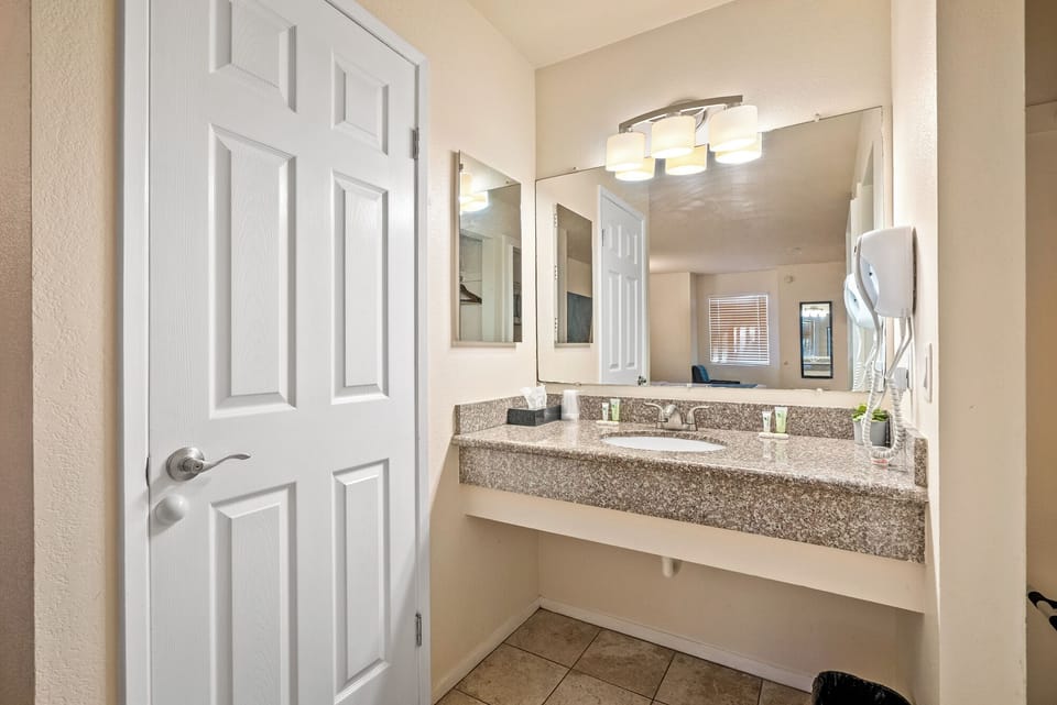 Standard Room, 2 Queen Beds | Bathroom | Shower, free toiletries, hair dryer, towels