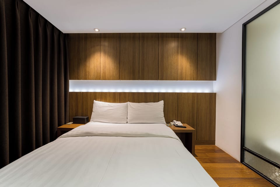 Premier Double | Individually decorated, individually furnished, blackout drapes