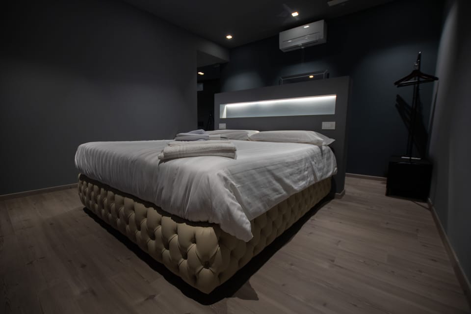 Deluxe Double Room, 1 King Bed, Refrigerator, Ground Floor | Frette Italian sheets, premium bedding, down comforters, pillowtop beds