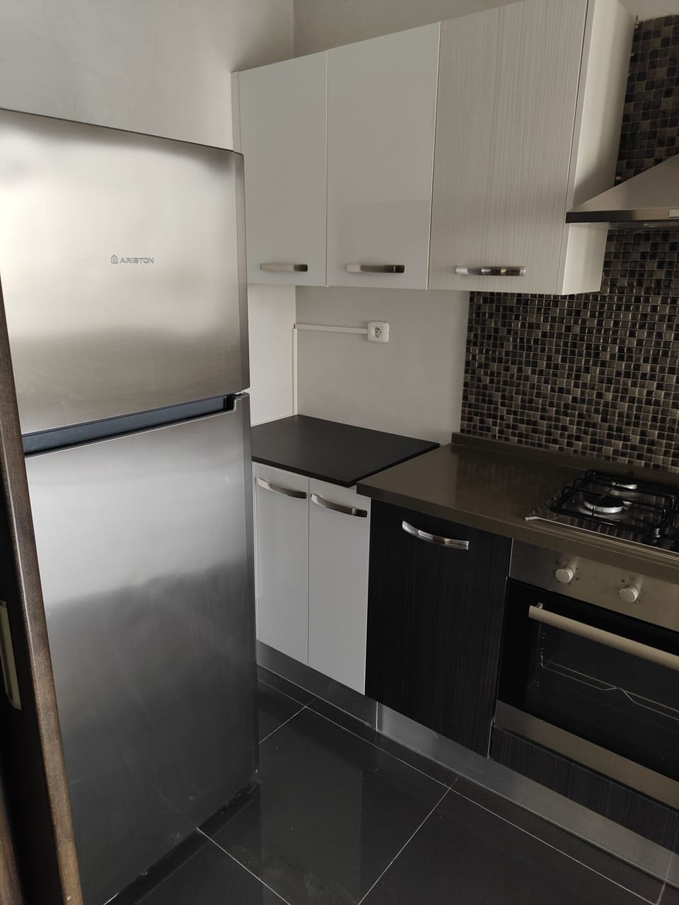 Fridge, cleaning supplies, paper towels