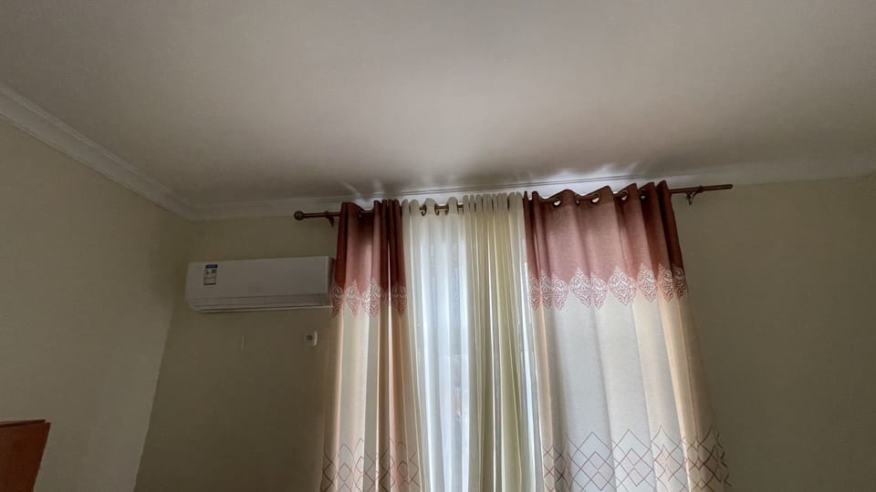 Desk, laptop workspace, WiFi (free), bed sheets