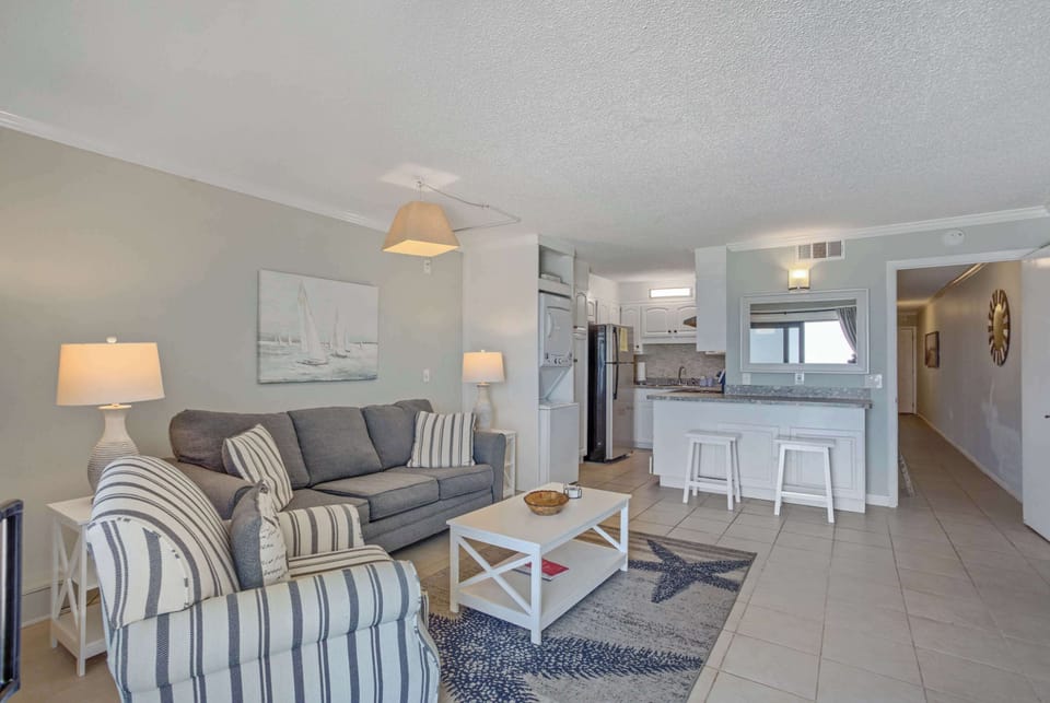 Condo, Multiple Beds, Balcony, Ocean View (Sunrise…Sunset) | Living area | 42-inch flat-screen TV with digital channels