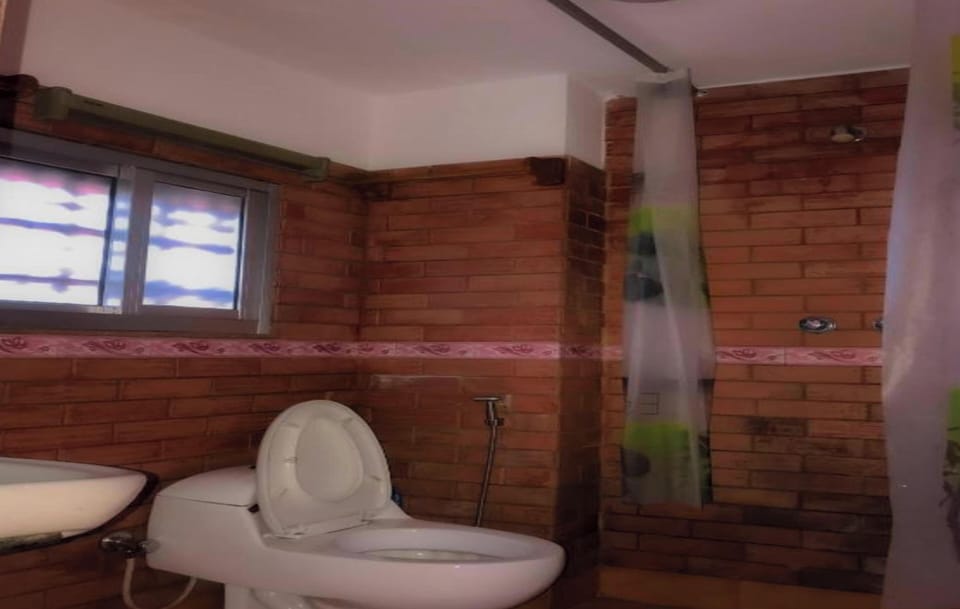 Shower, rainfall showerhead, towels, soap