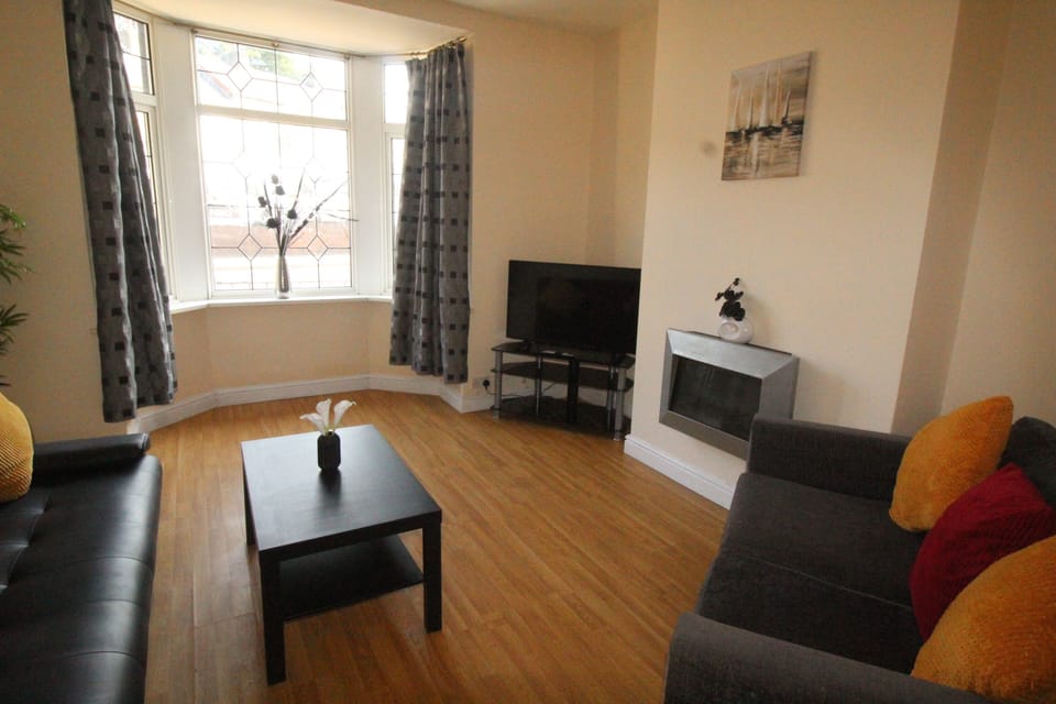 Comfort House | Living area | Fireplace