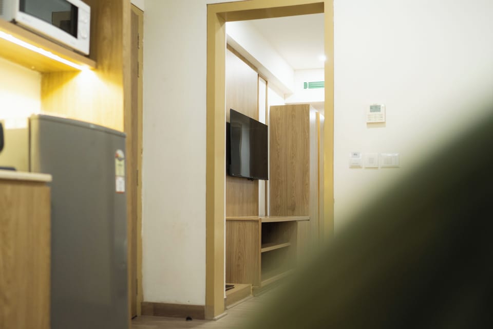Executive Suite | Premium bedding, minibar, desk, laptop workspace