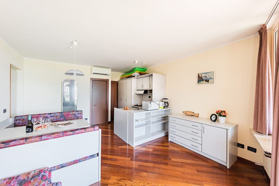 City Apartment | Living area | 35-inch TV with digital channels