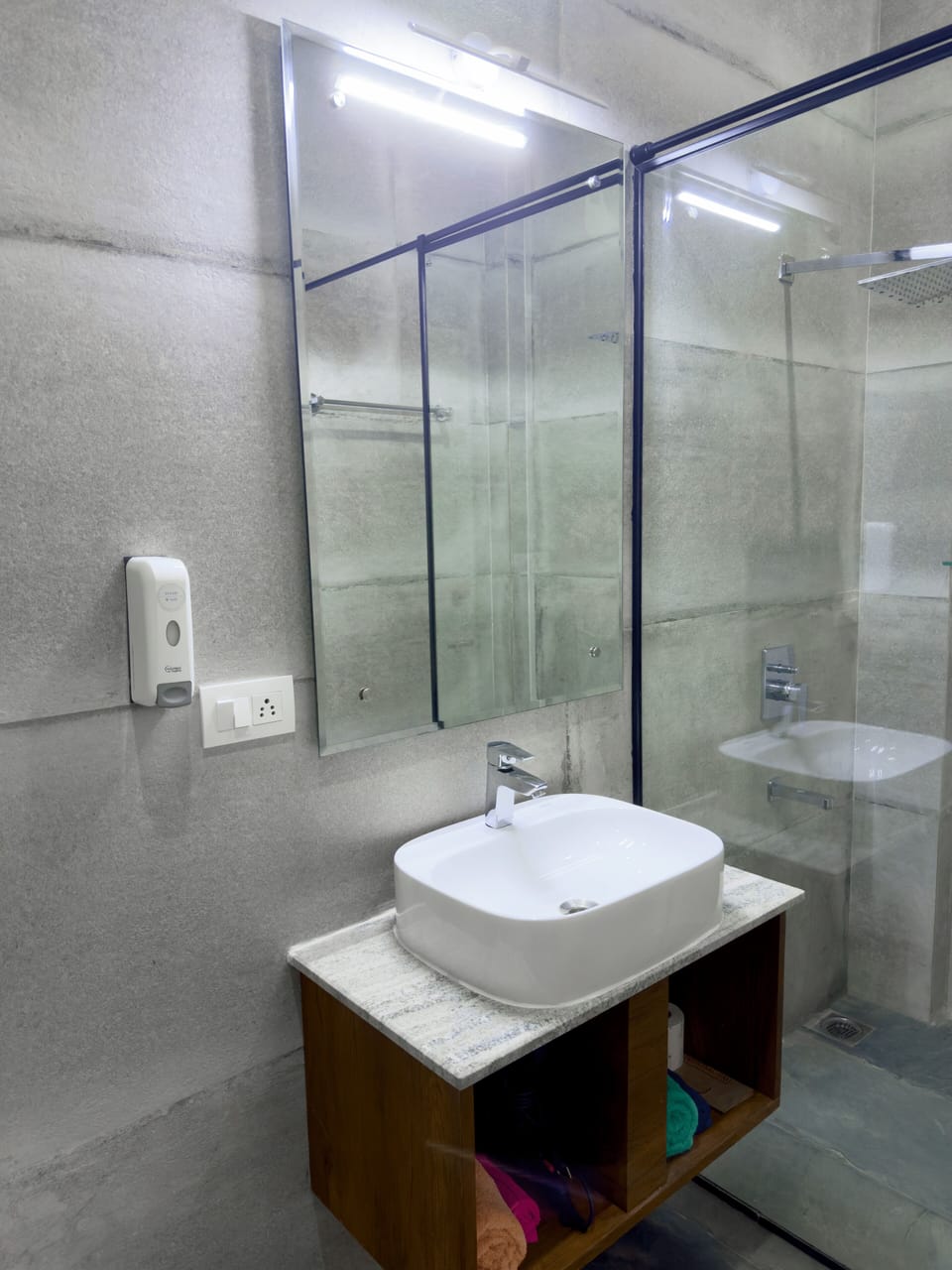 Shower, rainfall showerhead, hair dryer, towels