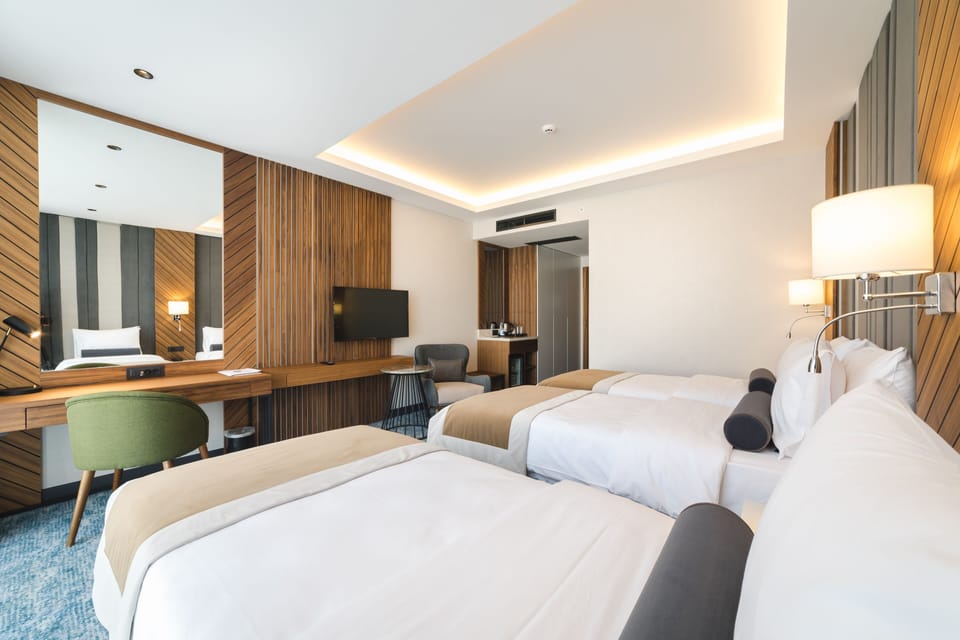 Standard Triple Room, 1 Bedroom, City View | Premium bedding, pillowtop beds, minibar, in-room safe