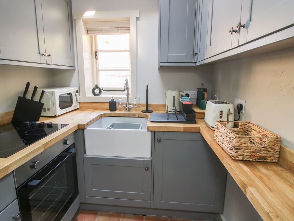Fridge, electric kettle, toaster, cookware/dishes/utensils