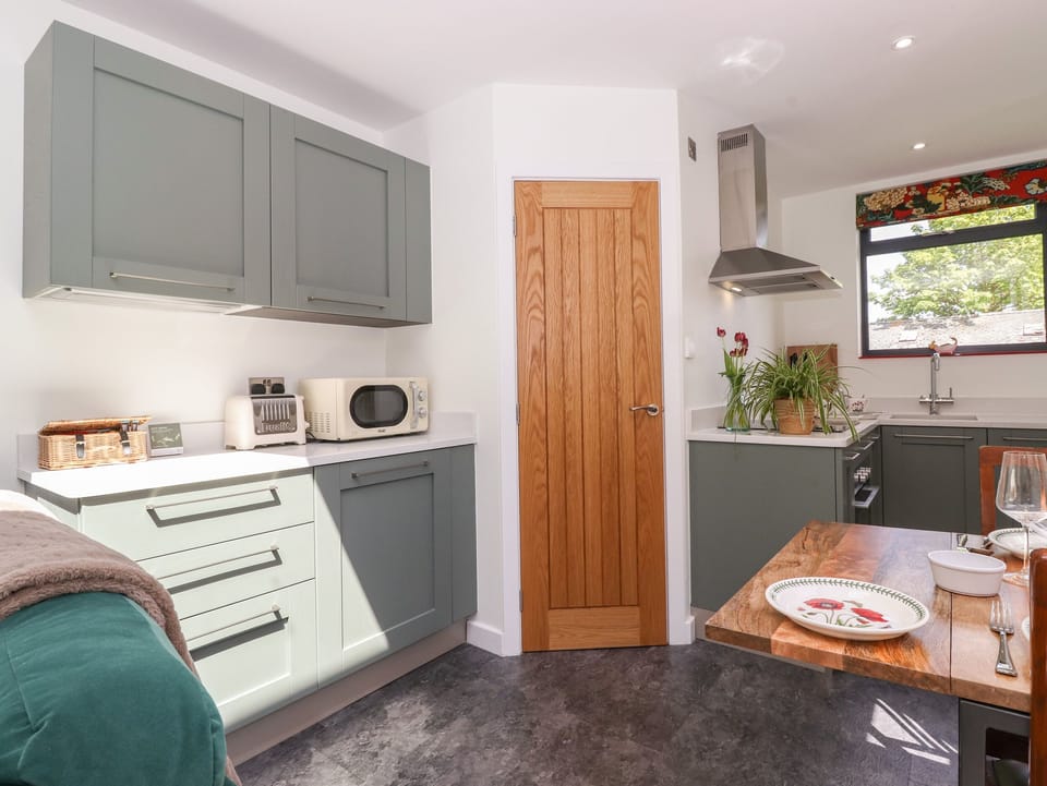 Fridge, electric kettle, toaster, cookware/dishes/utensils