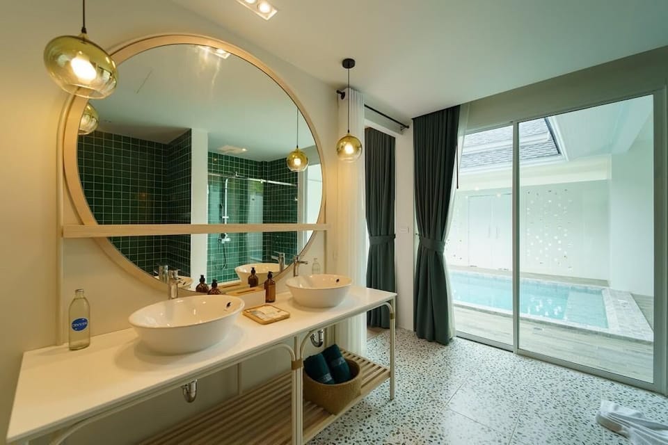 Grand Deluxe Pool Villa | Bathroom | Separate tub and shower, rainfall showerhead, free toiletries