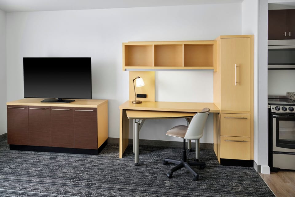Suite, 1 Bedroom | Living room | 32-inch Smart TV with cable channels, TV, Netflix