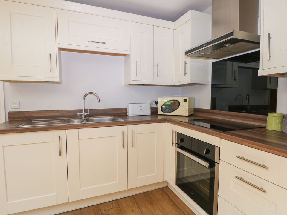 Fridge, electric kettle, toaster, cookware/dishes/utensils