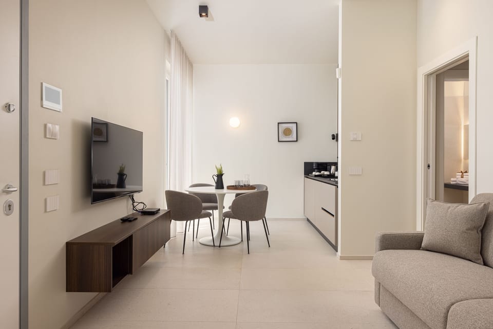 Deluxe Condo, Non Smoking, City View | Living area | TV