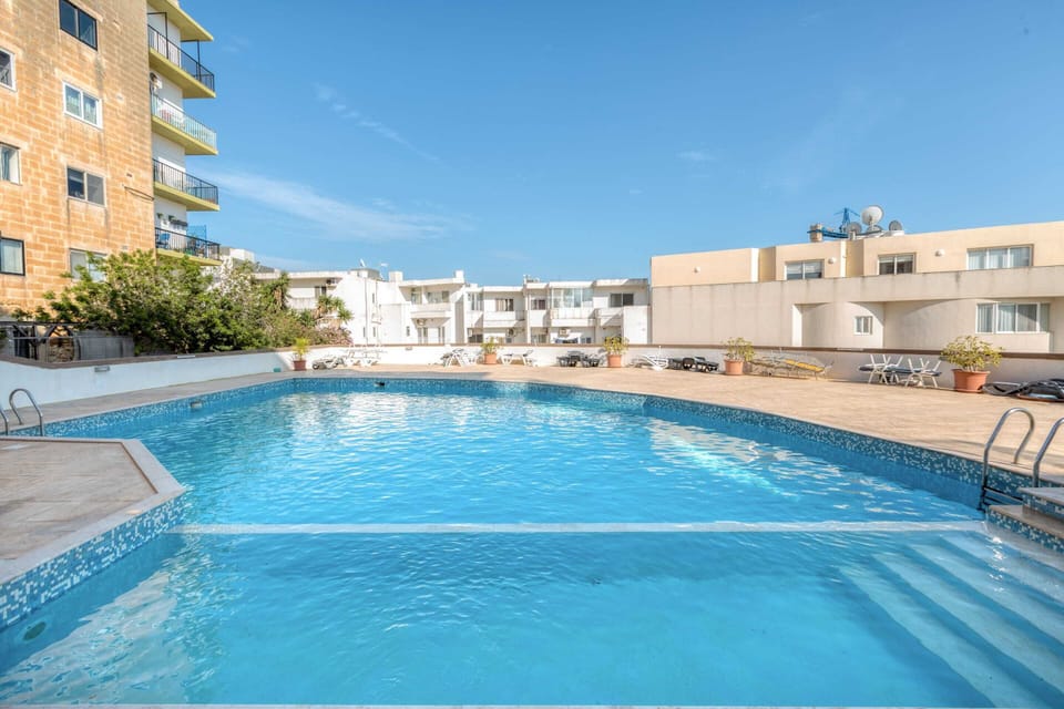 Basic Apartment, Multiple Beds | Pool | Seasonal outdoor pool