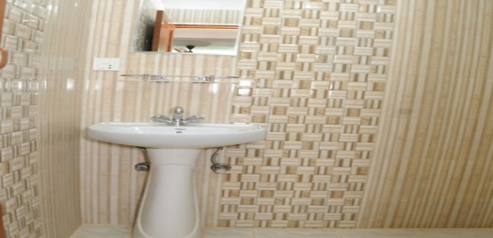 Shower, rainfall showerhead, towels, soap