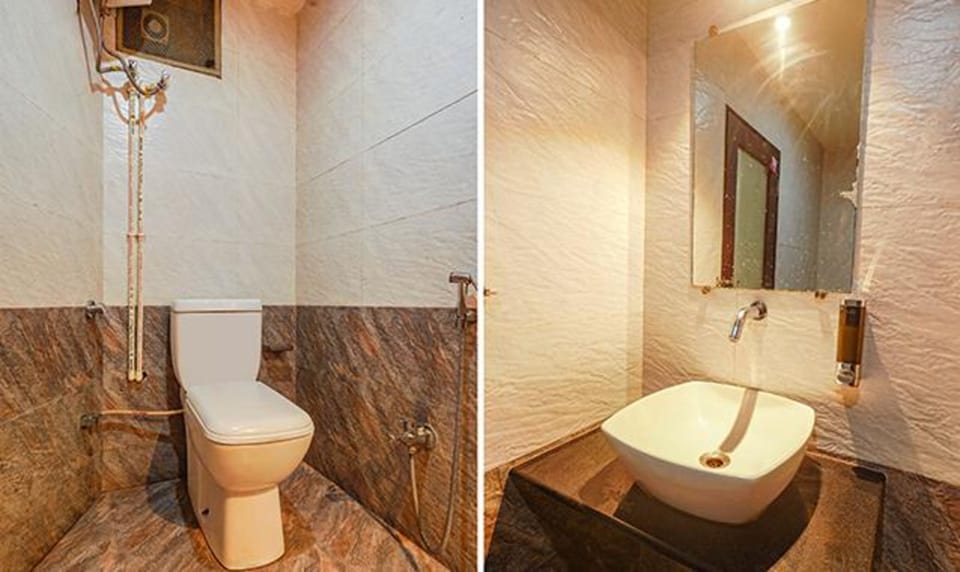 Deluxe Room | Bathroom | Shower, rainfall showerhead, free toiletries, towels