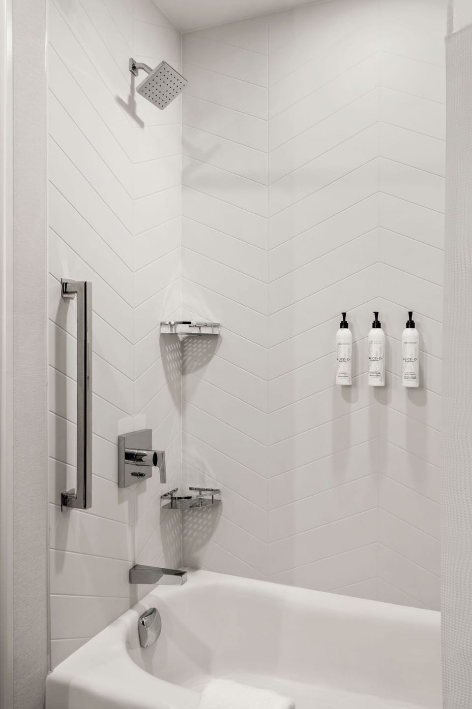 Bathtub, hair dryer, towels, soap