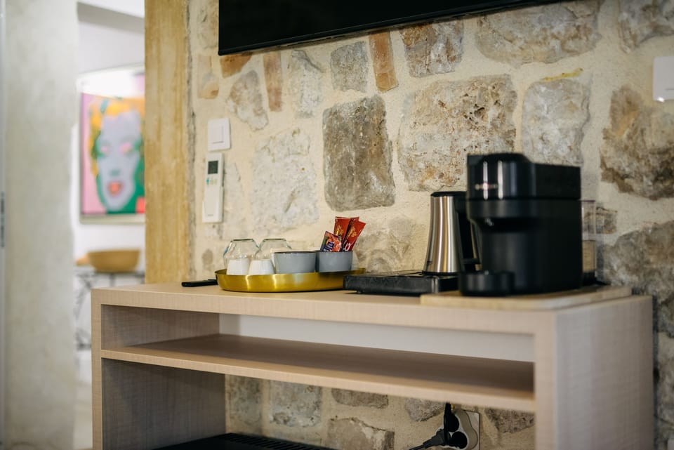 Fridge, coffee/tea maker, electric kettle, cookware/dishes/utensils