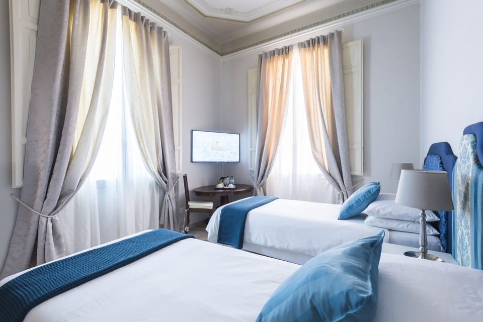 Basic Double or Twin Room (private external bathroom) | Pillowtop beds, in-room safe, individually decorated