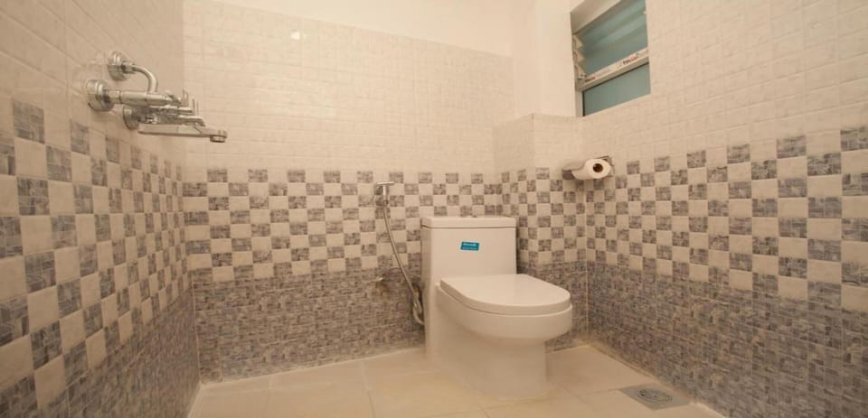 Shower, rainfall showerhead, towels, soap