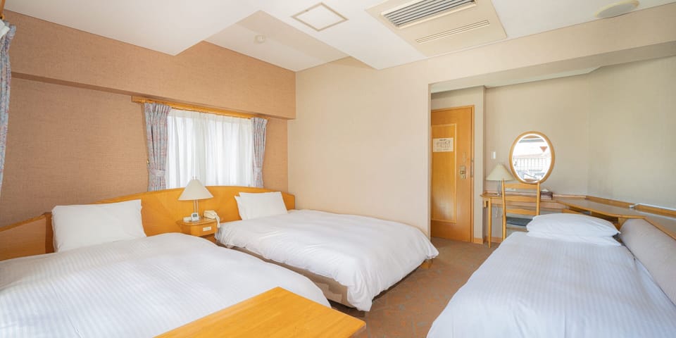 Basic Triple Room | Select Comfort beds, free WiFi, bed sheets
