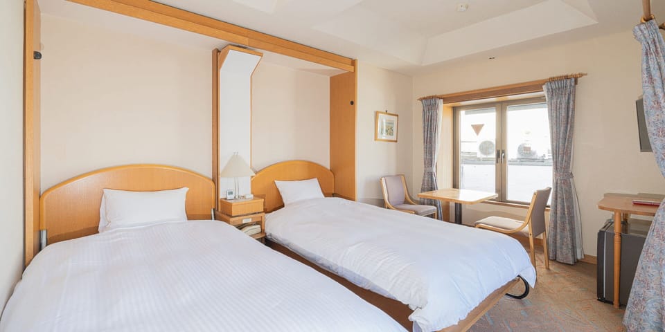 Basic Twin Room | Select Comfort beds, free WiFi, bed sheets