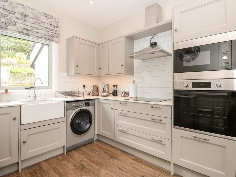 Fridge, electric kettle, toaster, cookware/dishes/utensils