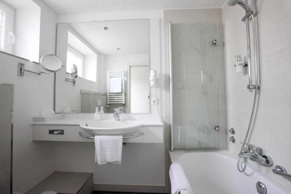 Hair dryer, towels, soap, shampoo