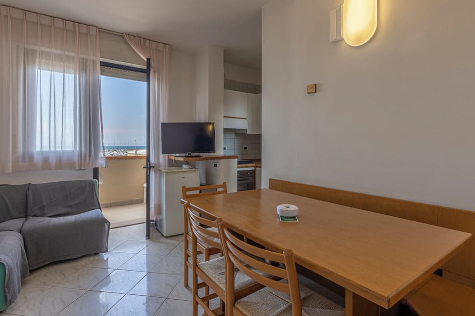 Panoramic Apartment | Private kitchen | Mini-fridge