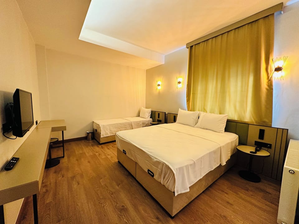 Egyptian cotton sheets, premium bedding, minibar, in-room safe