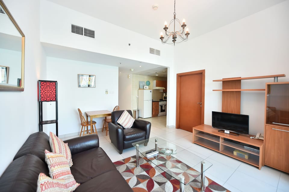 Standard Apartment, Marina View, Lakeside | Living area | Flat-screen TV