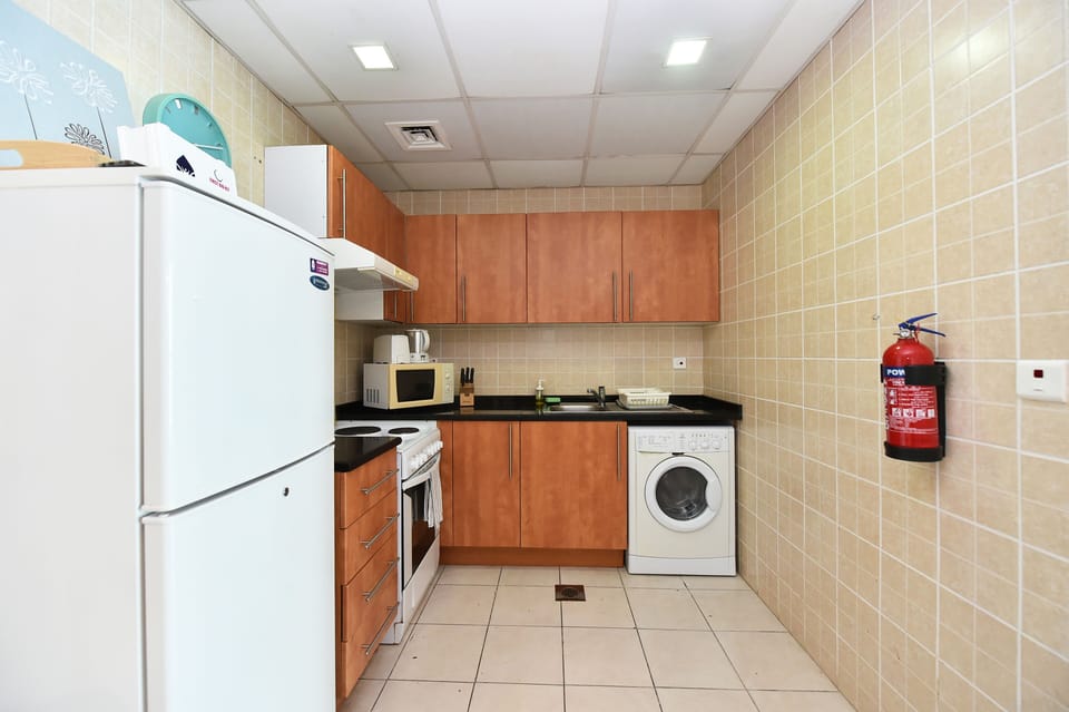 Standard Apartment, Marina View, Lakeside | Private kitchen | Full-size fridge, microwave, oven, stovetop