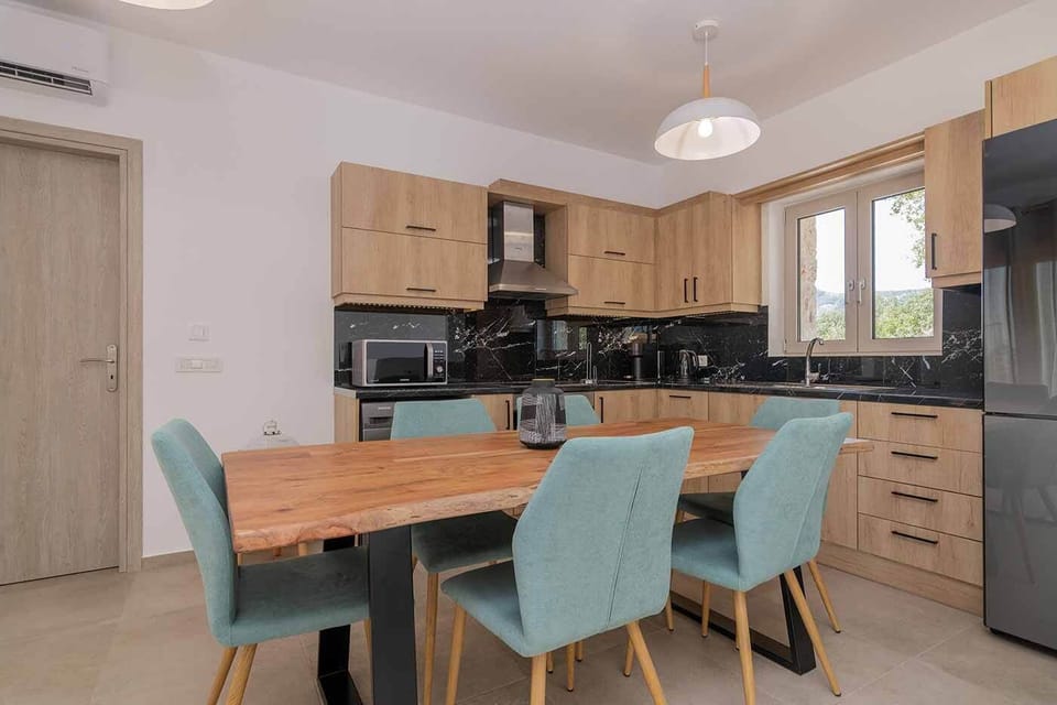 Basic Villa | Private kitchen | Full-size fridge, oven, dishwasher, electric kettle